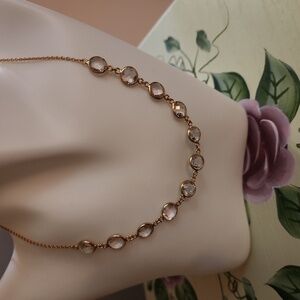 Elegant Gold And Topaz Necklace